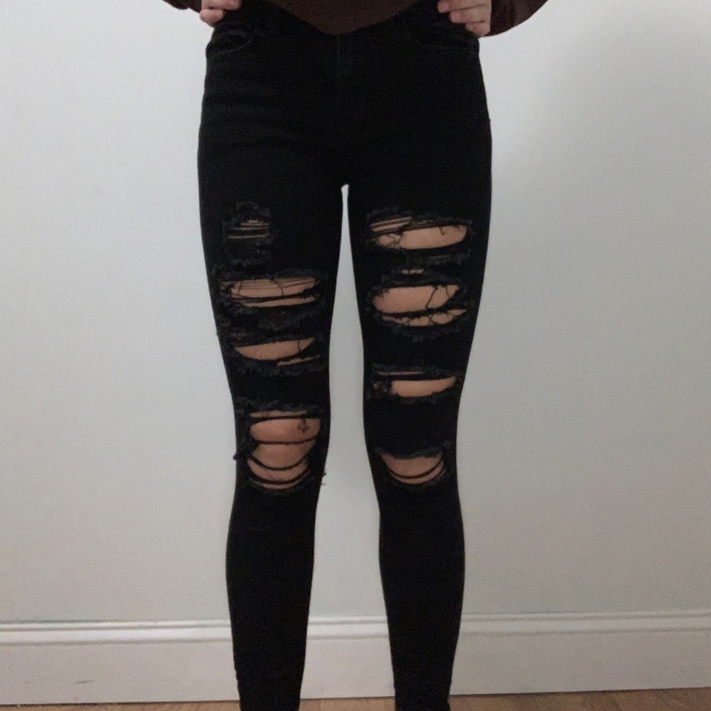 black ripped american eagle jeans
